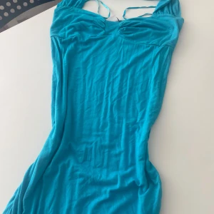 Blå klänning - Väldigt fin ljus blå klänning. Passar både XS och S