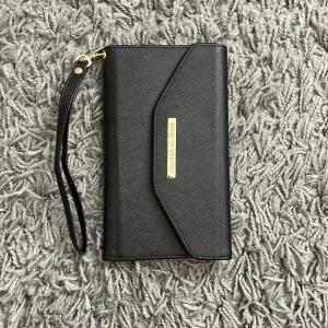 Mobilskal - Mobilskal/plånbok till en iPhone 7+ , inga effekter finns.