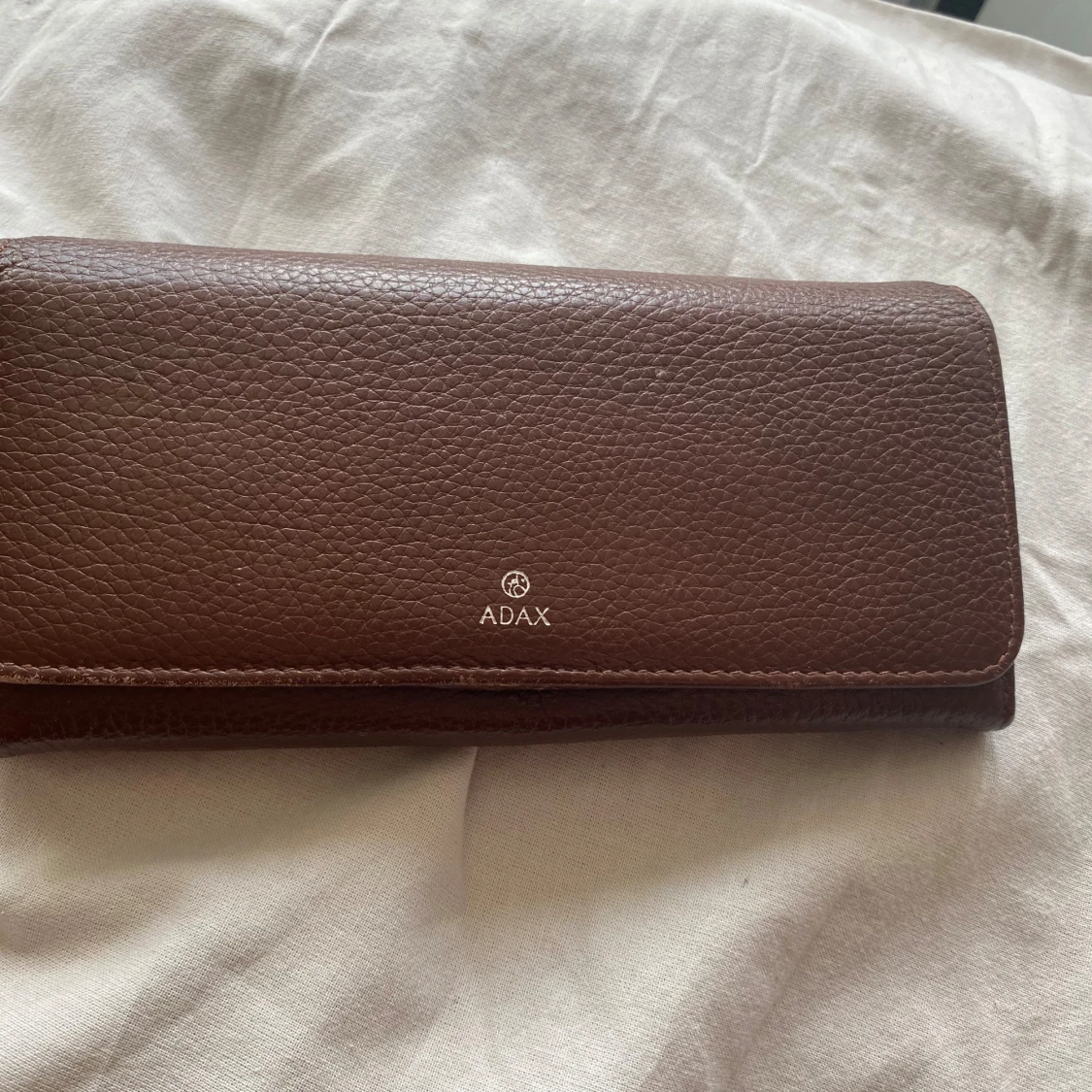 Plånbok av märket Adax