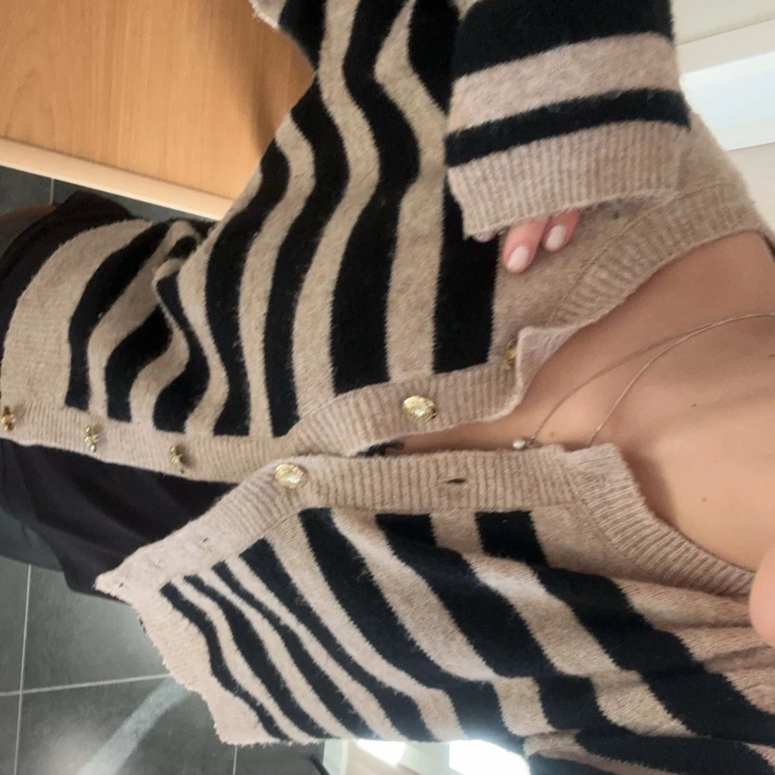 Randig kofta med knappar - 90