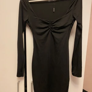 Klänning Prettylittlethings - Klänning från Prettylittlethings. Aldrig använd storlek UK 6, skulle säga den passar en XS. Aldrig använt