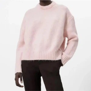 Ljusrosa stickad tröja - Liten defekt