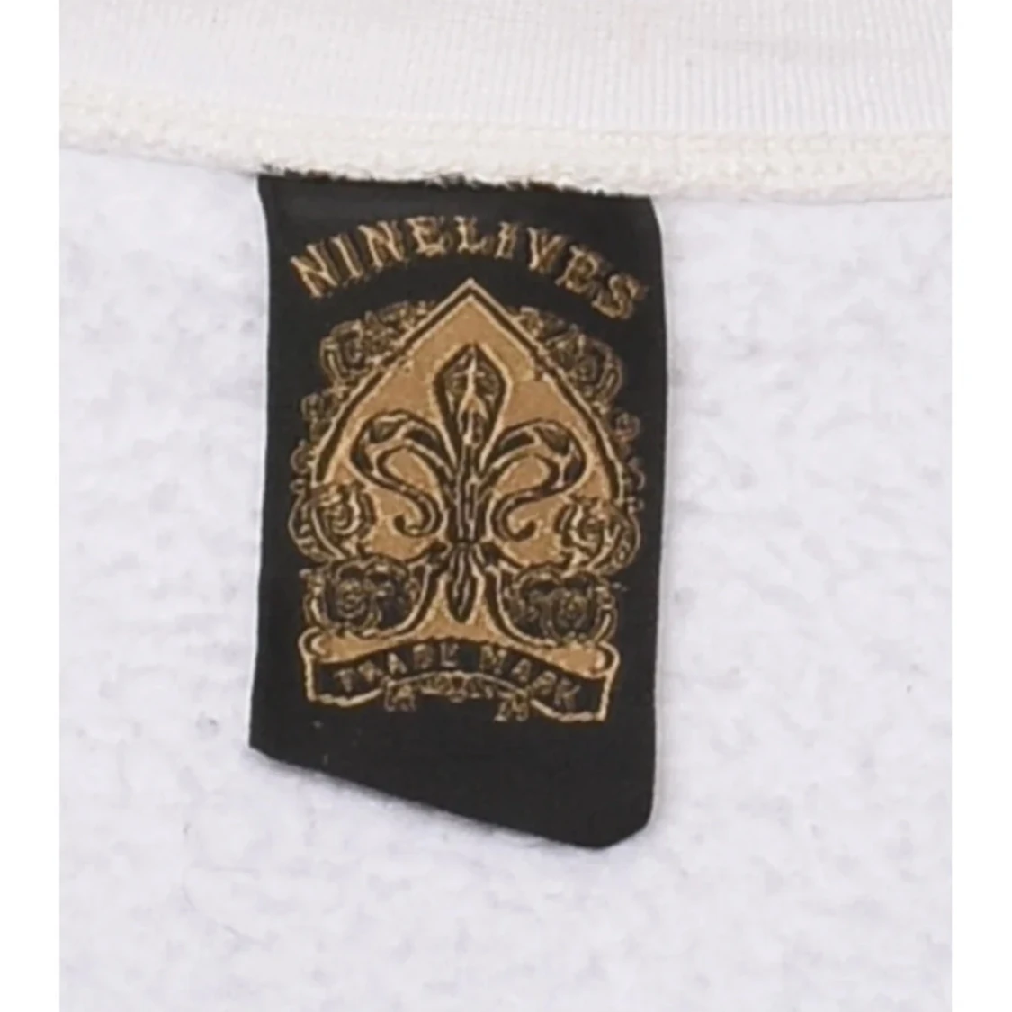 Vit jacka med tryck från NINELIVES - 91