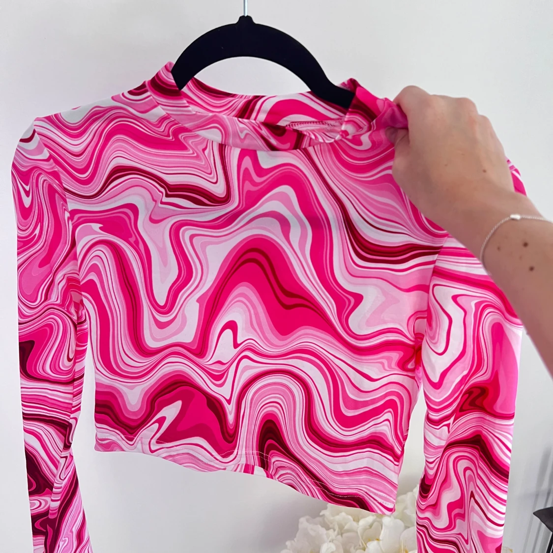 Croppad rosa långärmad teöja