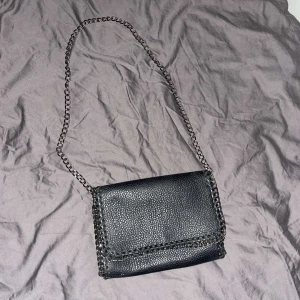 Skinn väska - En skinn väska i fint skick 