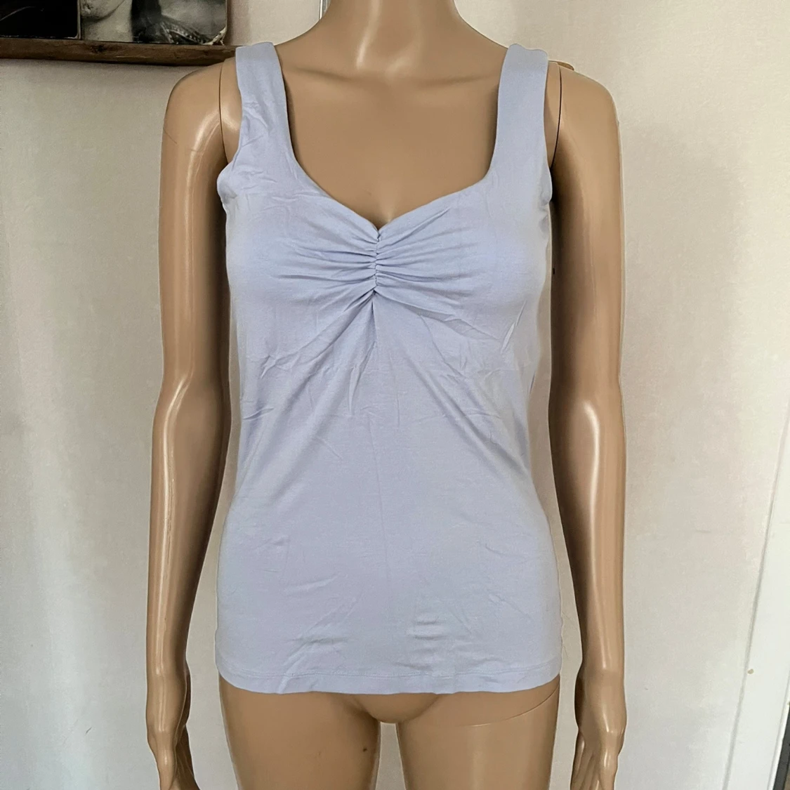 Linne som framhäver bysten