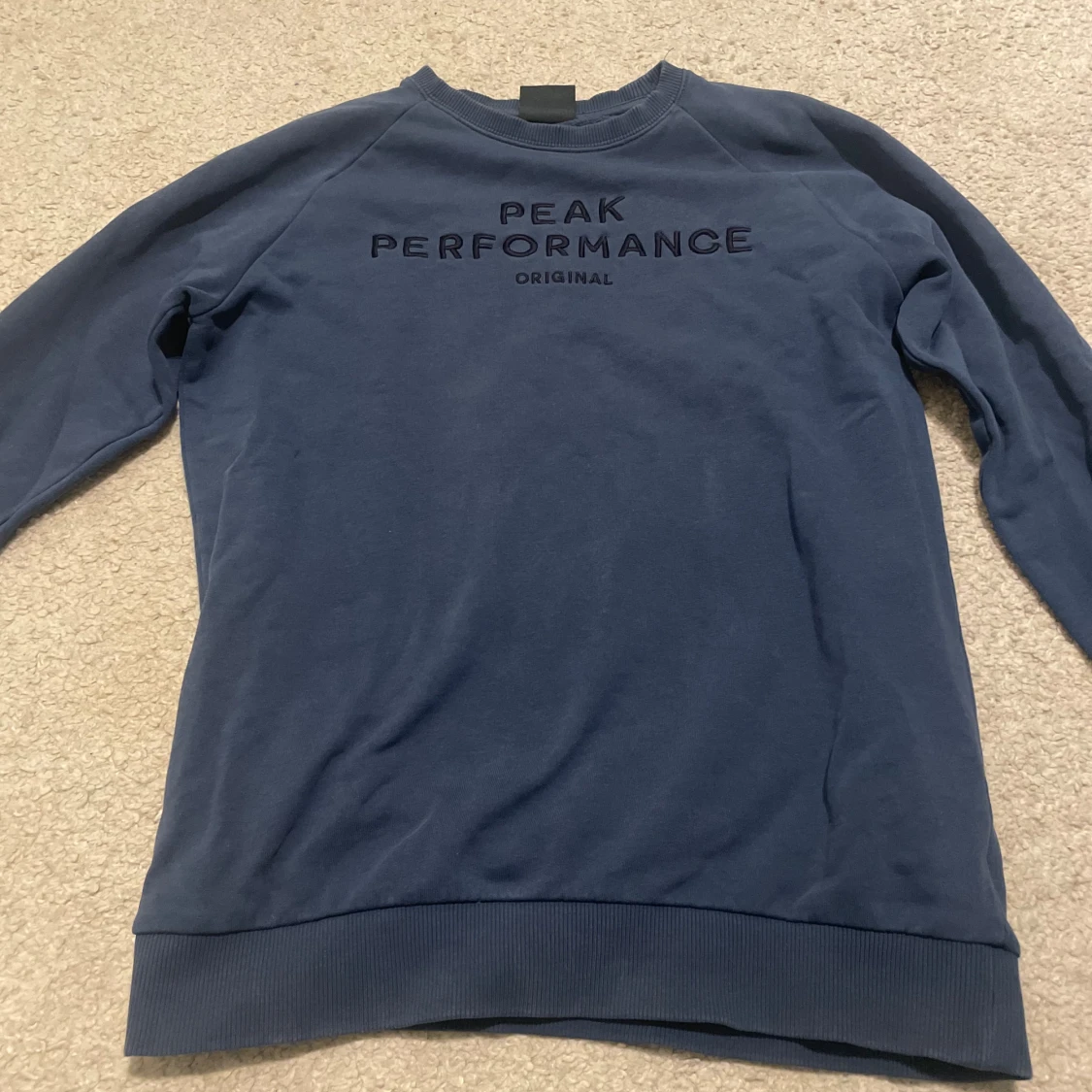 Blå Peak Performance