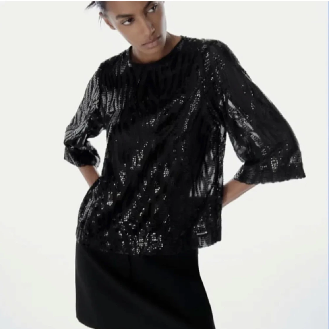 Svart glittrig topp