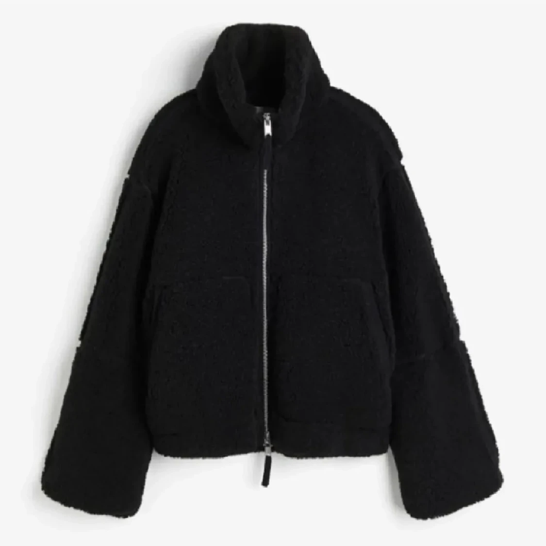 Svart teddyjacka