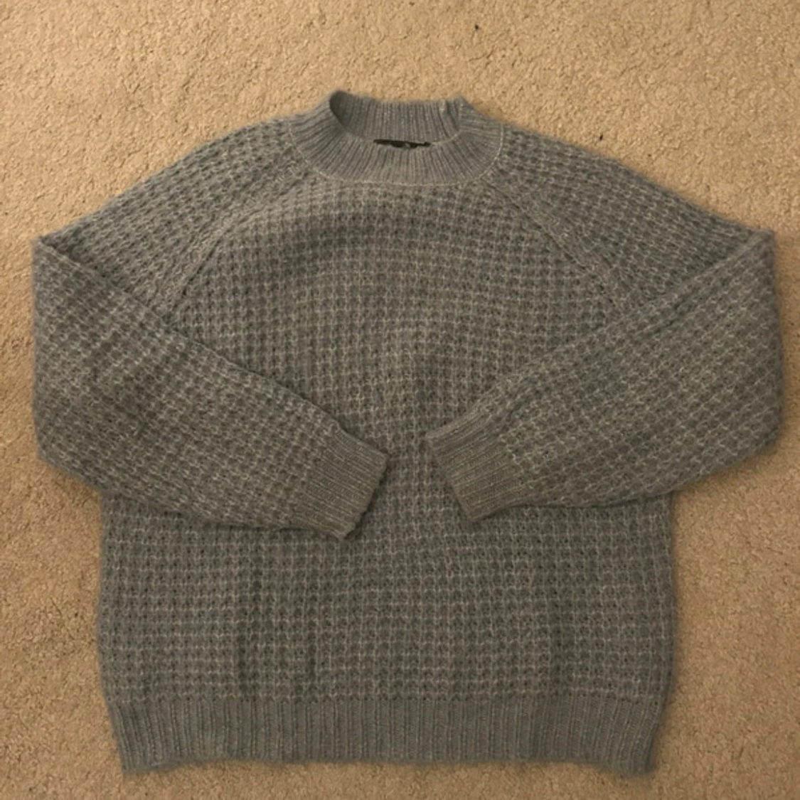 Blå stickad tröja från 157