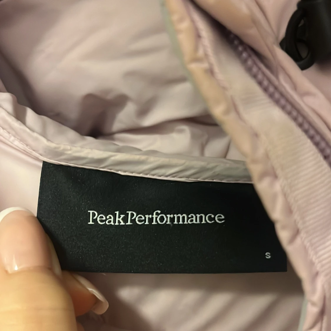 Ljusrosa dunjacka från Peak Performance - 91