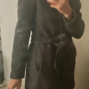 Tiger of Sweden Calista Wool-blend coat - Elegant and in a great condition, I have never used it. Perfect to wear for special occasions, at work, university, or a night out, or a formal event. Colour is between black and grey, sort of a dark grey.