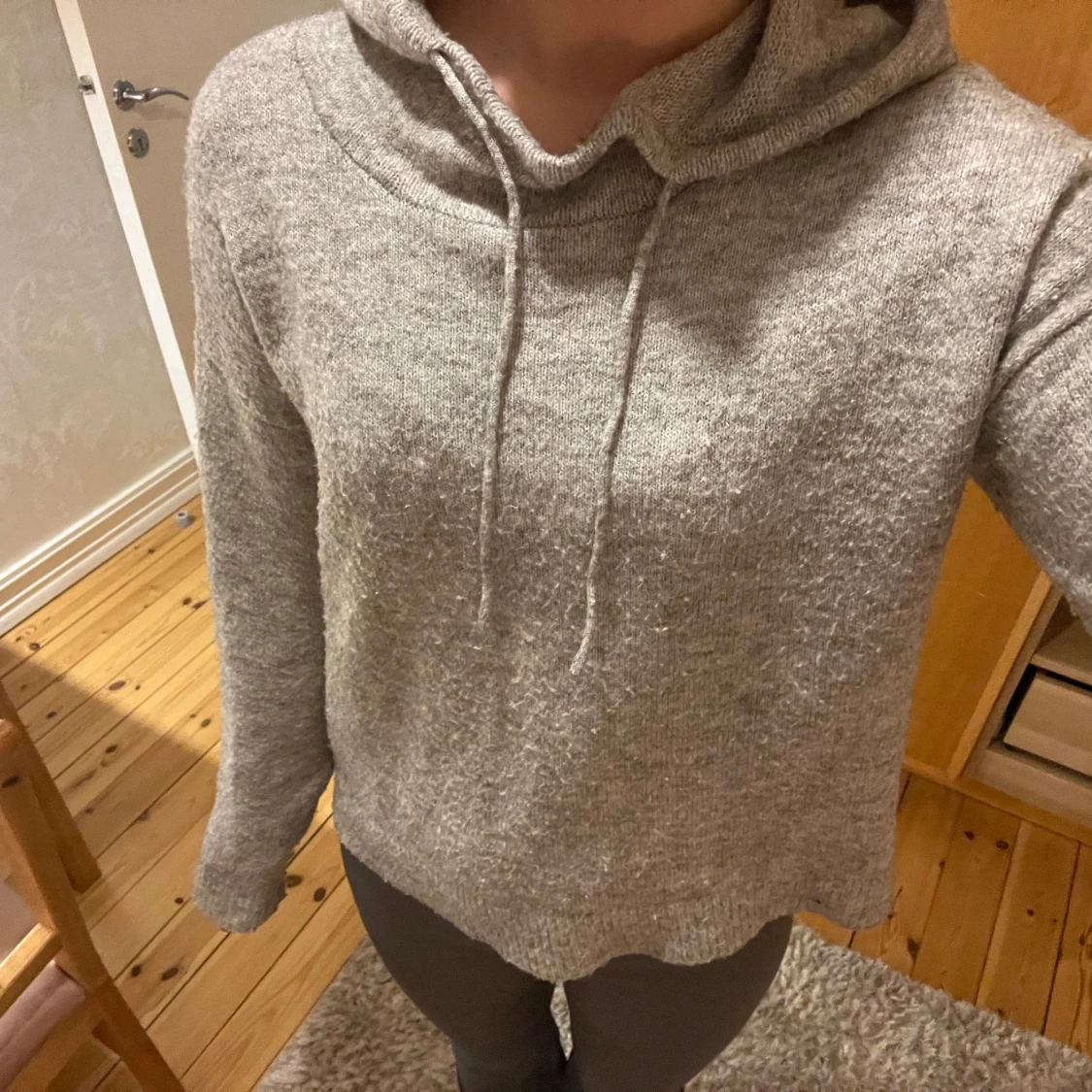 Stickad hoodie