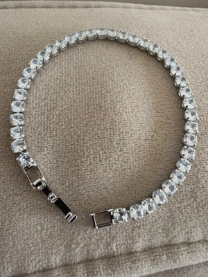 Sterling Silver 925 Zirconia Armband  - Sterling Silver 925 Zirconia Armband. 18 cm långt med 4 mm Zirconia stenar. 925-silverstämpel. 