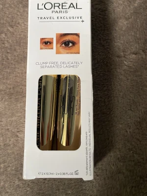 L'Oréal Paris Volume Million Lashes Mascara - Säljer en exklusiv duo-pack mascara från L'Oréal Paris, Volume Million Lashes. Förpackningen innehåller två guldglänsande tuber som ger separerade och klumpfria fransar. Perfekt för dig som vill ha definierade och fylliga ögonfransar.