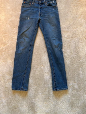 Levis 501 - Ett par Levis 501 i storleken 12A vilket är 152 cm, bra skick och nästan aldrig använda, skriv vid frågor.