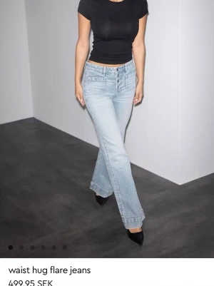 Gina jeans - Säljer ett par ljusblåa jeans med medelhög midja från gina i storlek 38. Aldrig använda. 