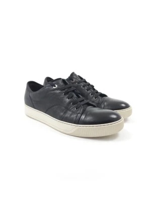 Lanvin Toe Cap Sneakers  - •The Shoes has been gently used and is in very good condition, comes with dustbag •Size:  44 •Color: Black •Retail price: 5000SEK •Insole: 28.4cm