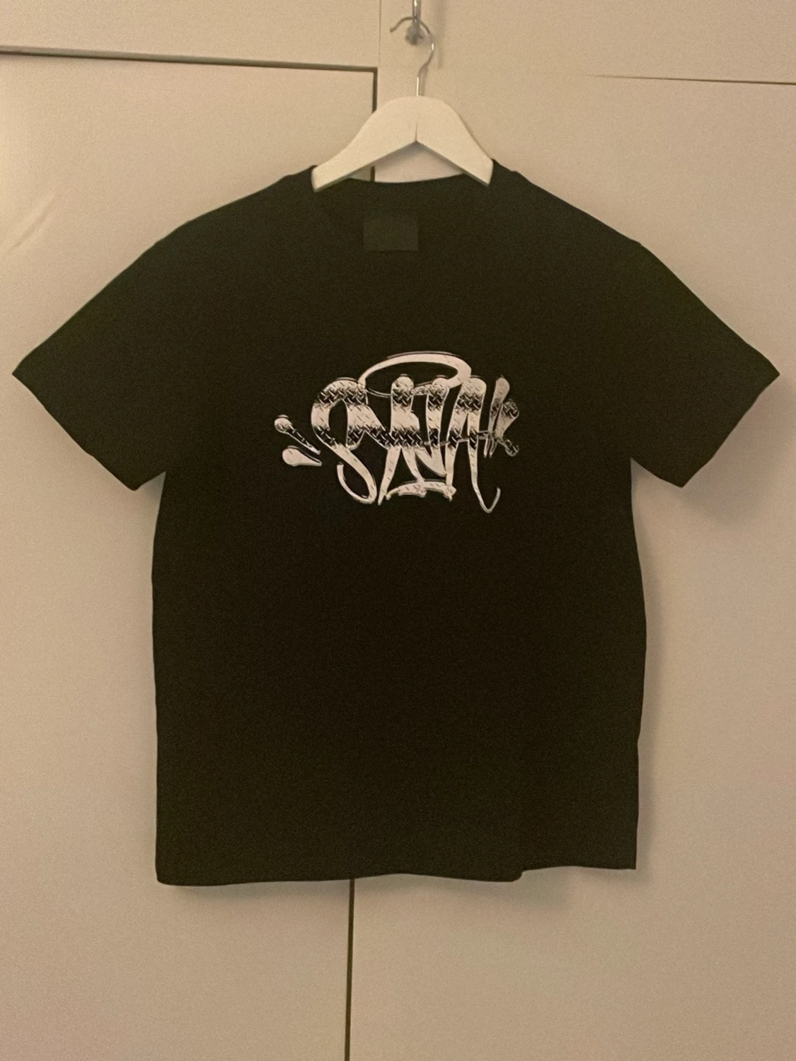 Syna world tshirt