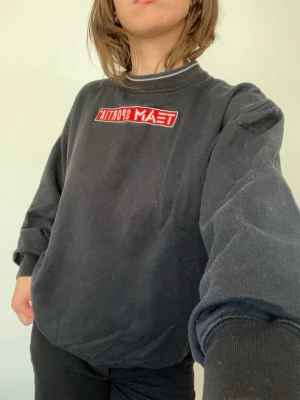 Svart sweatshirt Team Sportia - Svart oversized sweatshirt från Team Sportia 