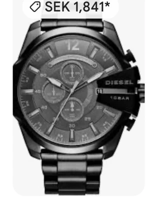 Svart kronografklocka från Diesel - Snygg svart klocka från Diesel med robust länkarmband i metall och stor urtavla med flera subdials. Klockan har markerade index, datumvisning och en cool, industriell look. Perfekt accessoar för dig som gillar statement pieces.