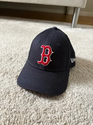 Baseball keps junior size - Snygg ovanlig baseball keps. Köpt i New York. Helt ny & aldrig använd. 