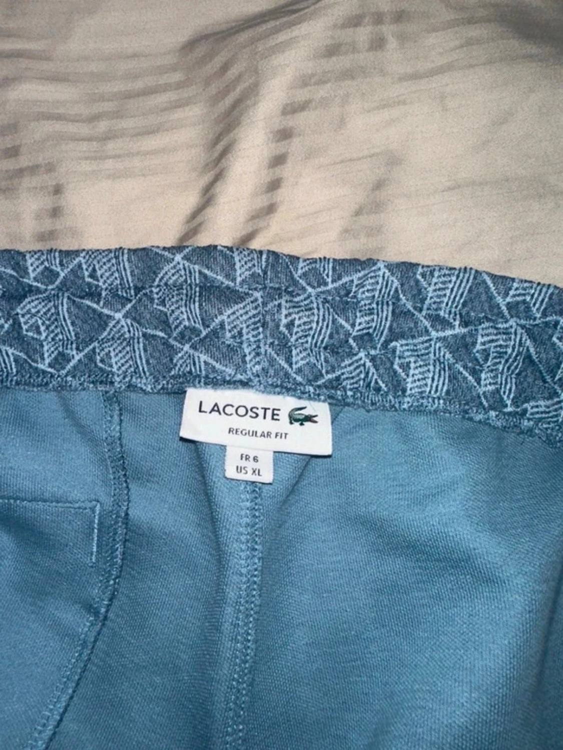 Blå mönstrad vindjacka och byxor från Lacoste  - 4