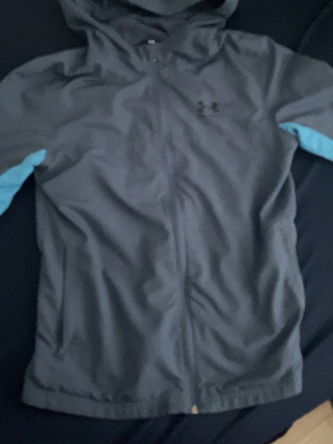 Blå vindjacka från Under Armour