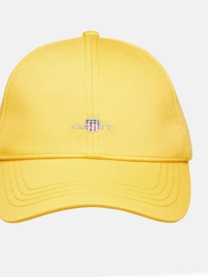 Gul keps från Gant  - Helt ny och Snygg keps från Gant med broderad logo och sköld framtill. Justerbar rem baktill med metallspänne för perfekt passform. 