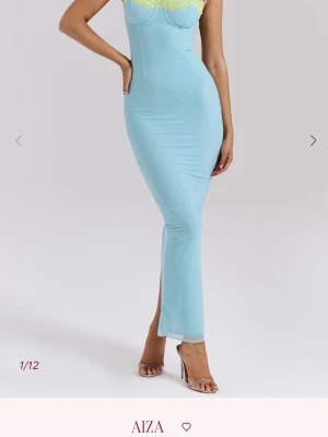 House of cb - Aiza dress - The gorgeous details and delicate Ocean blue tone of 'Aiza' are so pretty. Cut from our signature stretch mesh that sculpts and shapes, 'Aiza' has the most delightful lace up to the back that's presented in a contrast Lime hue. Wear yours with delicate heels like 'Lola' in a neutral tone for pretty date nights or drinks with the girs. Regular cup (A-C)