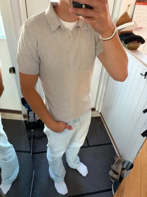 Beige piké från Dressman - Schysst piké från Dressman. Inga skador.