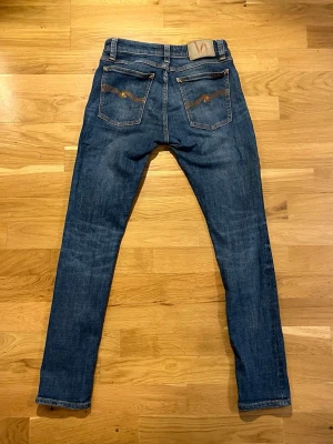 Nudie - Jeans  - Sköna Nudie jeans jeans, fin tvätt| Storlek: 28/30, slim fit