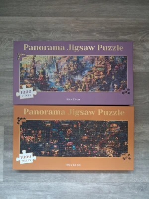 Panorama Jigsaw Puzzle 1000 bitar 2st - Två panorama pussel med 1000 bitar vardera.. Storlek på pusslen är 98 x 33 cm. Perfekt för dig som gillar utmanande och kreativa pussel.