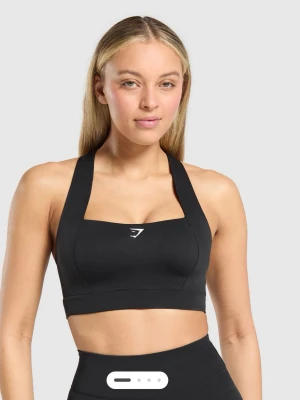 Svart sport-bh från Gymshark - Helt oanvänd, oöppnad i orginalförpackning! Sport-bh i svart från Gymshark med breda axelband och racerback-design. Materialet är stretchigt och följsamt, perfekt för träning. Diskret Gymshark-logga på bröstet. Snygg och funktionell modell som ger bra stöd
