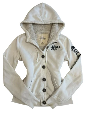 Cute vintage Hollister fur button zip up hoodie M - Cute Hollister vintage button up white fur hoodie, size Medium M, great condition 