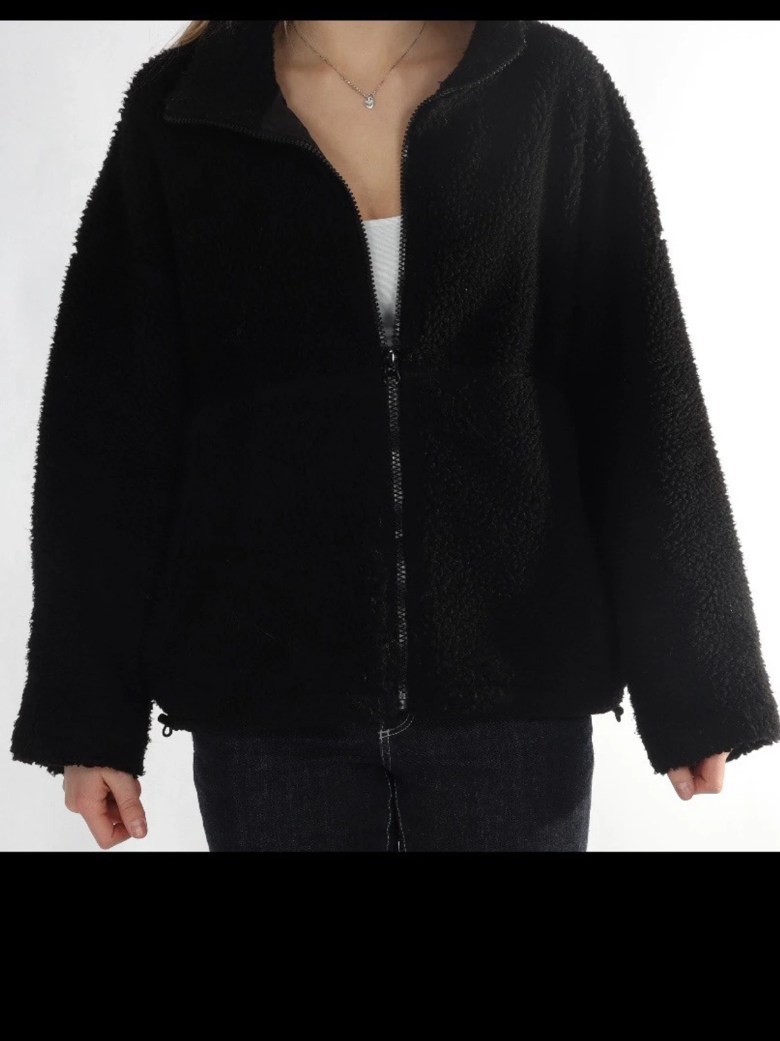Svart teddyjacka med dragkedja