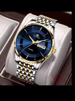 Blå och guld herrklocka Quartz  - Stilren herrklocka från Fourron med blå urtavla, guldfärgade detaljer och dag/datumvisning. Armbandet är i silver och guldtonat metall, vilket ger en lyxig känsla. Perfekt accessoar för dig som vill sticka ut med en elegant look.                     Den är sprillans ny. Kommer i orginalförpackning