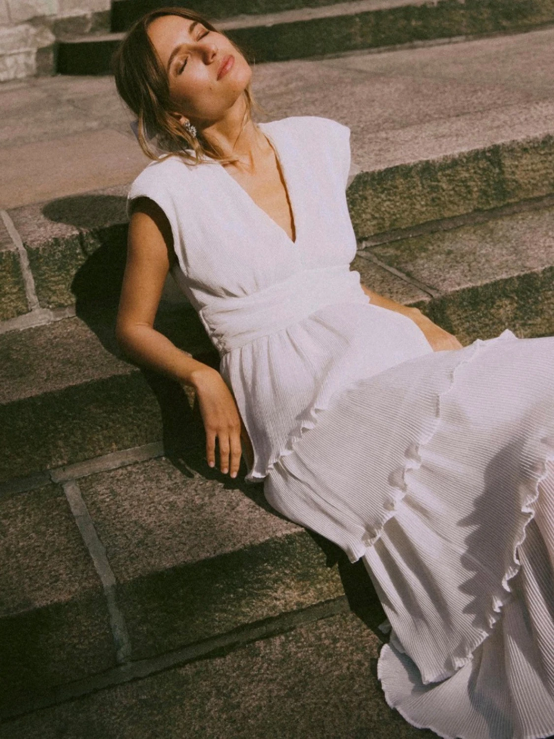 Vit långklänning med volanger