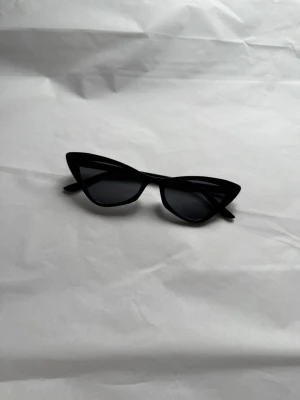 Svarta cat eye solglasögon - Helt nya har aldrig kommit till användning.