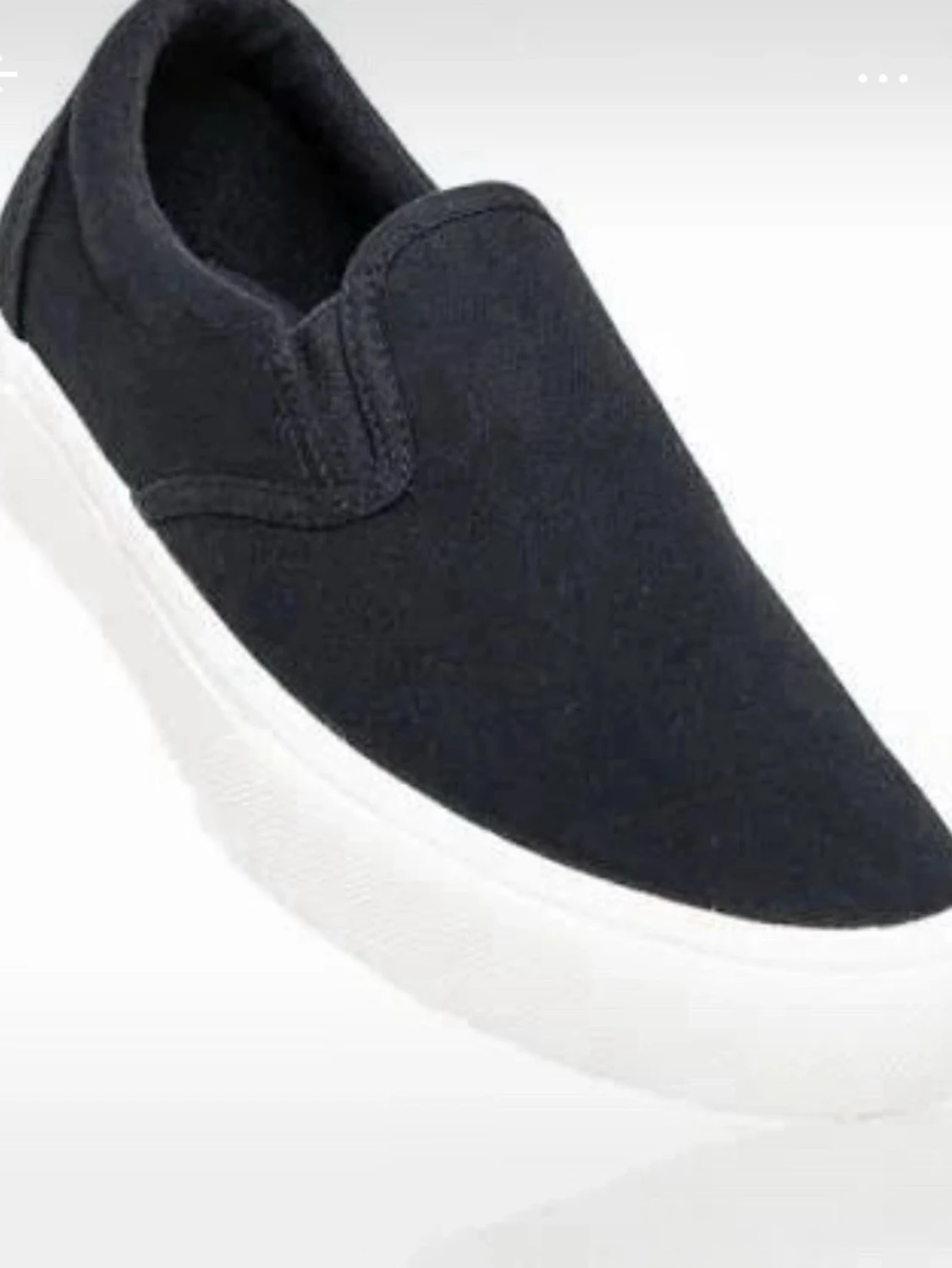 Svarta slip-on sneakers