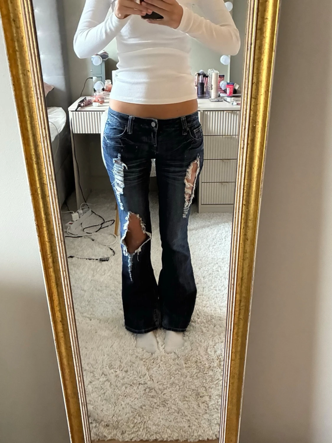 Mörkblå slitna bootcut jeans - 2