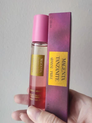 Giorgio Armani Magenta Tanzanite - Giorgio Armani Magenta Tanzanite Perfume. 33ml bottle. New! A great winter/fall fragrance.