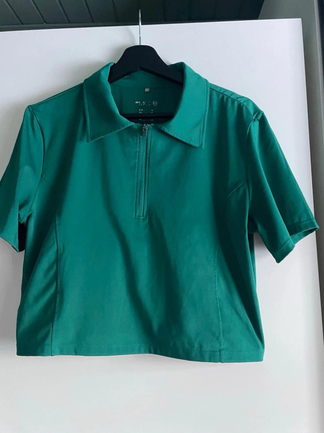 Grön croppad half zip topp H&M Move