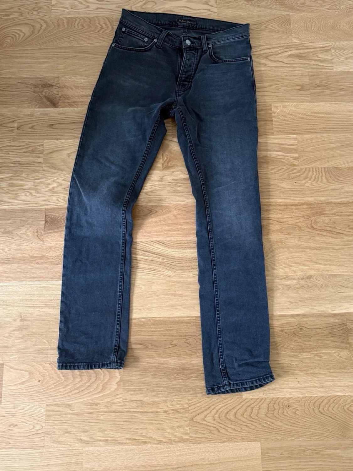 Mörkgrå Nudie jeans Grim Tim
