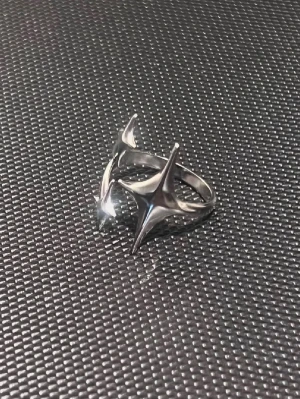 Shooting Stars - Justerbar, rostfritt stål