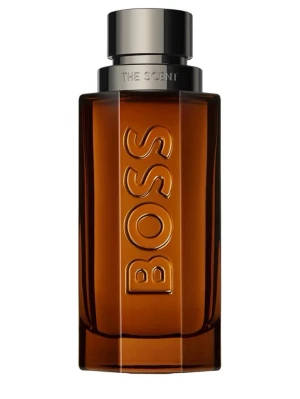 Hugo Boss The Scent herrparfym - En elegant herrparfym från Hugo Boss i en stilren, rektangulär flaska av brunt glas med silverfärgat lock. Flaskan har BOSS ingraverat på framsidan och en metallring med texten THE SCENT. Perfekt för dig som gillar klassisk och maskulin design.