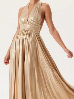 Guldig balklänning  - Säljer guldig klänning med metallic effekt