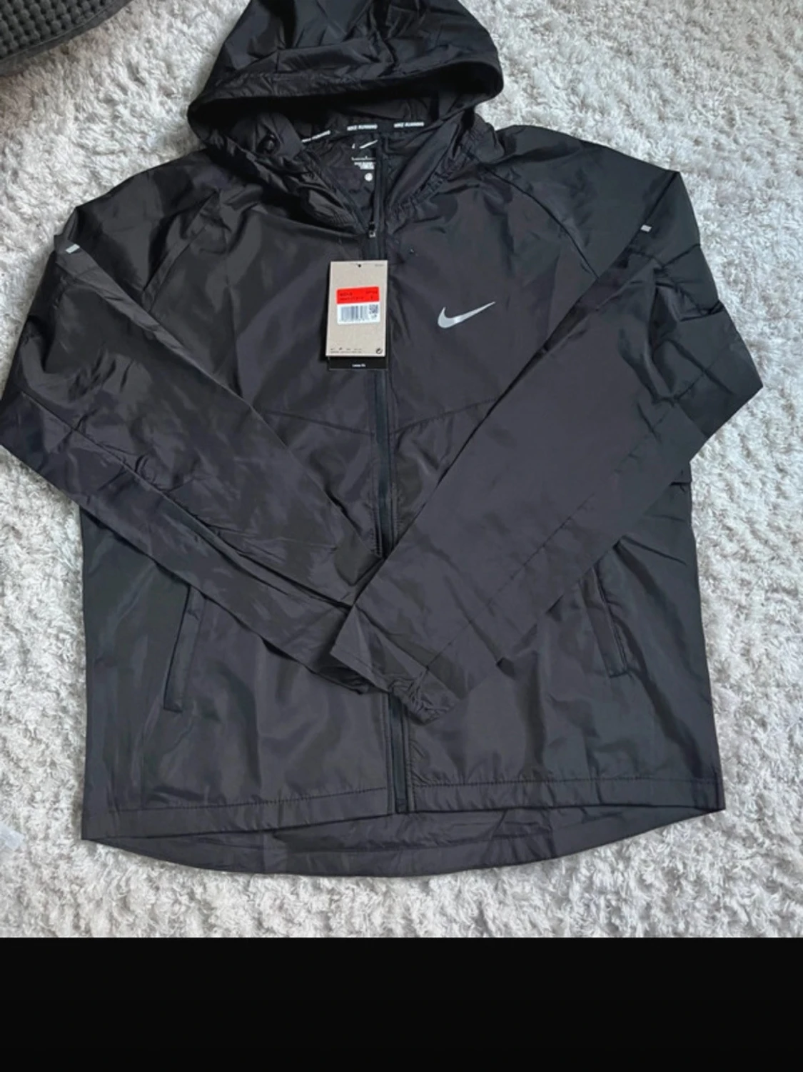 Svart Nike vindjacka med huva