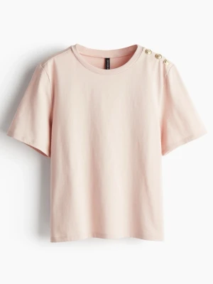 Ljusrosa t-shirt med guldknappar - Snygg ljusrosa t-shirt från H&M-divided med dekorativa guldknappar på ena axeln⭐️Skön och avslappnad passform🥰Storlek xs