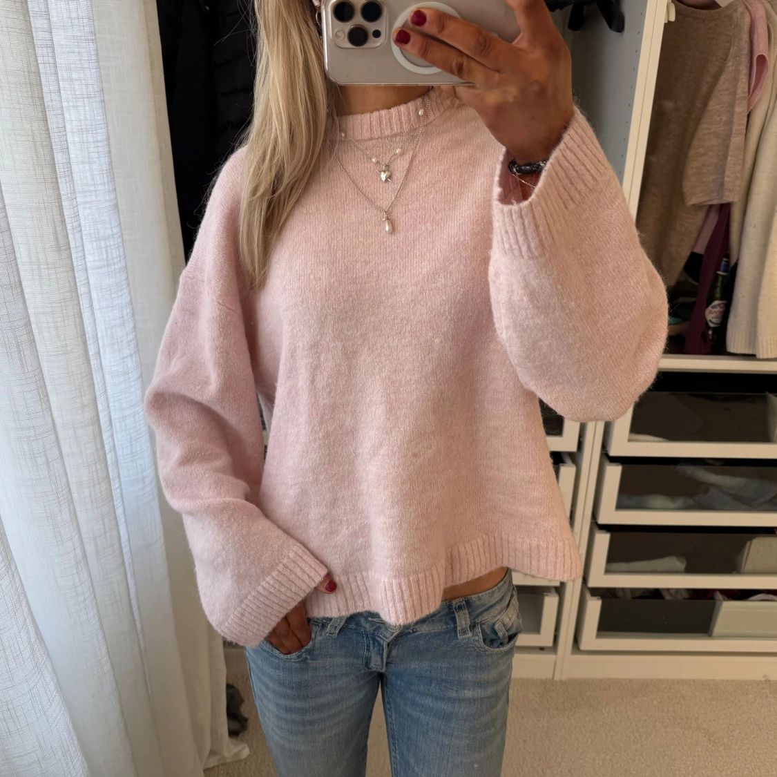 Ljusrosa stickad tröja